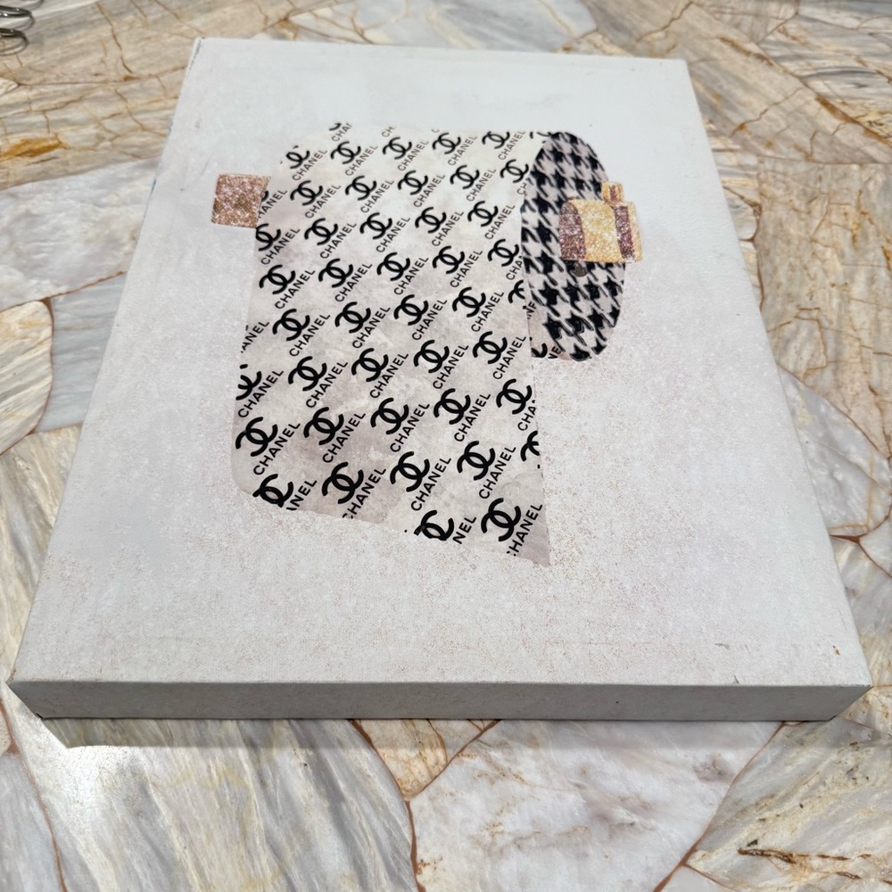CHANEL Monogram Canvas with Gold and Black Accents
